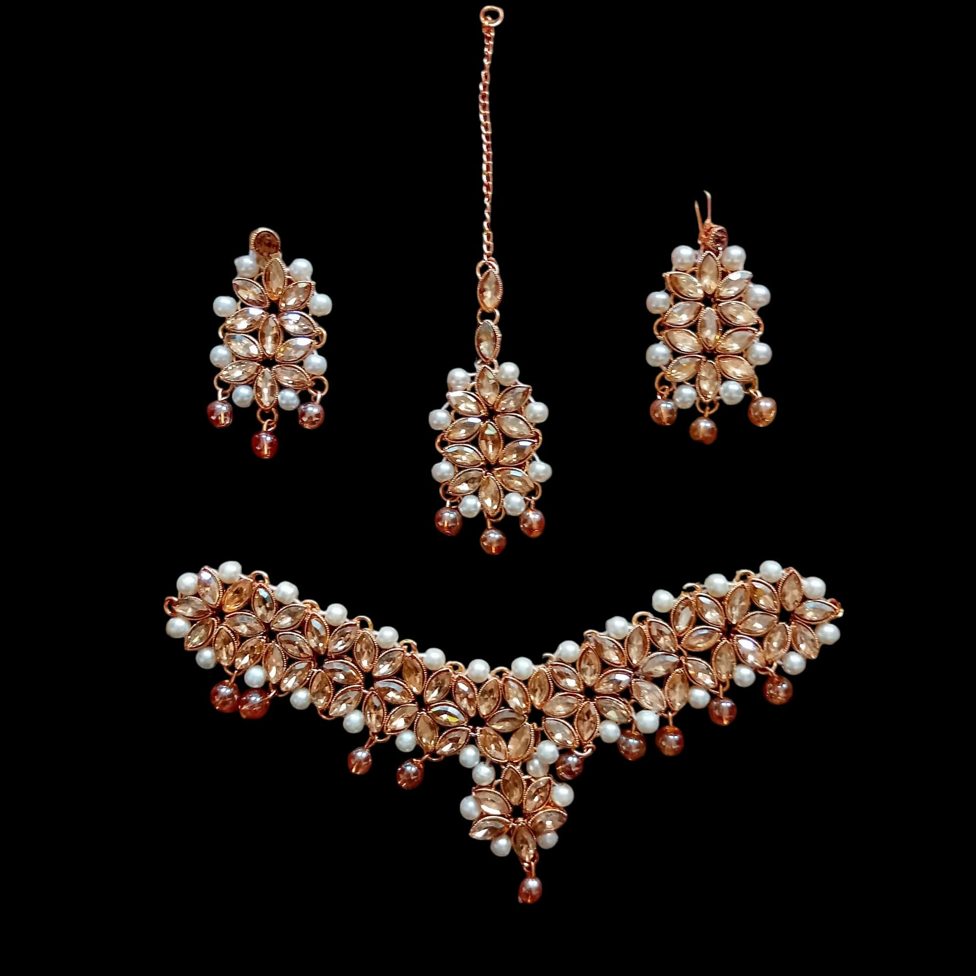 Buy Golden colour jewellery set with necklace , earrings and tikka at best price in pakistan